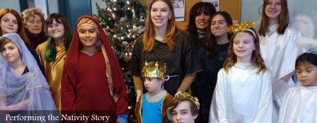 Children and adults performing the Nativity story