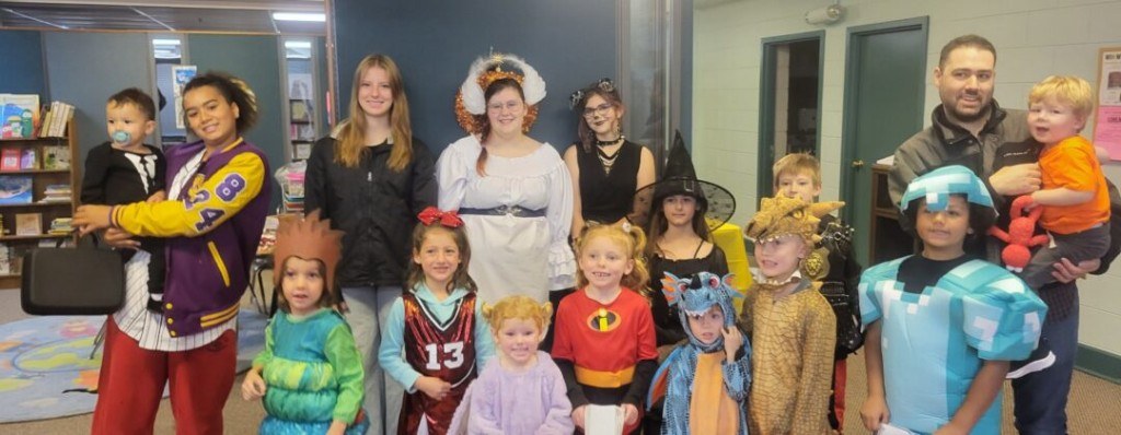 Families gathered in costume at a community event