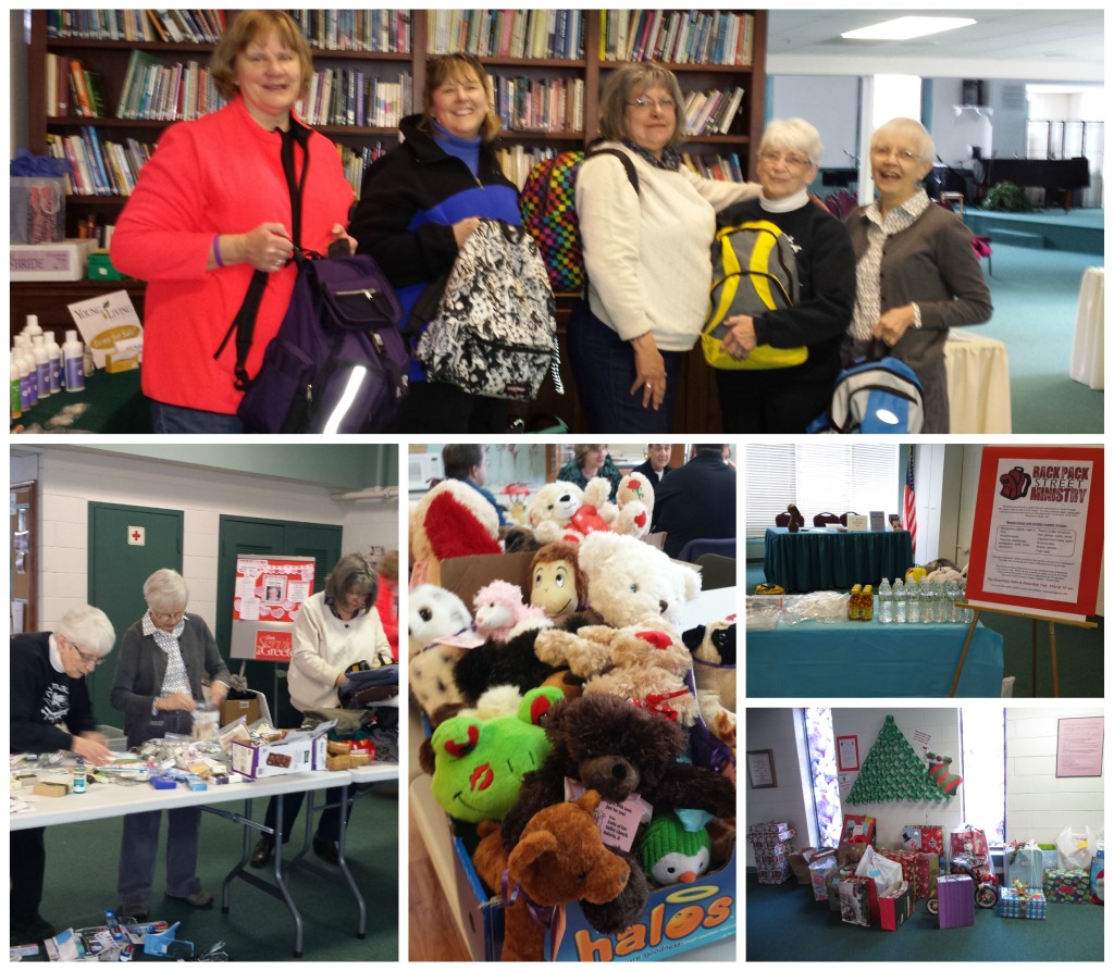 Volunteers with backpacks, stuffed animals, and wrapped holiday gifts for the backpack and gift ministries